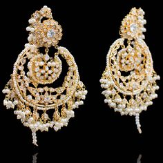 Blending the old world charm with the grace of a modern bride! These statement heritage earrings feature layers of CZ stones bonded together by delicately carved pearl beads. Approximate earrings length is 4". Gold-plated on high-quality brass as base metal. Made by order. Kindly allow 4-6 weeks for the delivery of this item. For custom or urgent requests, please contact support@alacouture.com. *Please Note: We use faux stones and beads in all of our jewelry. Carved Pearl, Unique Gift Cards, Create Words, Traditional Attire, Faux Stone, The Grace, Old World Charm, Modern Bride, Cz Stone