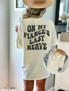 ⚡️😵 On My Fiance's Last Nerve Tee 😵⚡️ ⚡️❤️😍 Wife Life Tshirt 😍❤️⚡️ Comfort Colors Front and Back SIZING & MATERIALS: Printed on Unisex Comfort Colors c1717 garment-dyed t-shirt for a relaxed fit; the fabric brings extra coziness to your wardrobe while the relaxed fit makes it an excellent daily choice.  .: 100% ring-spun cotton .: Medium fabric (6.1 oz/yd² (206.8 g/m *Sizing down one size will give you a more fitted look* *Sticking with your normal size gives a nice relaxed look* *Sizing up Fiance Shirts For Her, Bachelorette Party Lake Weekend, Fiance Shirts, Vintage Garden Parties, Front Tuck, Wife Life, Event Outfit, Cute Wedding Ideas, Comfort Colors Shirt