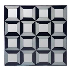 an abstract black and white design with squares on it's sides is featured in this image