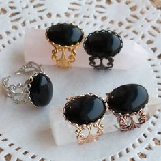 This black onyx filigree ring features black onyx stones (which measure 13 x 18 mm.)    Black Onyx is the semi-precious birthstone for July.  If you're into boho chic, or cottagecore, this onyx stone ring is a great accessory for you - and I have it in a variety of finishes.   It's easily adjustable by gently pulling the sides apart, or closer together. Like everything else here in HollysPrivateIdaho, they are made with love in a smoke-free home. Please allow 24 - 48 hours for creation and packa Boho Chic Jewelry, Style Cottage, Saratoga Springs, Black Onyx Stone, Black Onyx Ring, I Carry, Gold Filigree, Filigree Ring, Onyx Ring