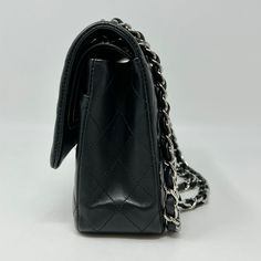 Chanel 2020 Classic Medium Double Flap Bag with Silver-tone Hardware and Turn-Lock at Front, Chain Link Shoulder Strap (Includes Authenticity Card, Seal, Dustbag) Est. Retail: $10,800, Minor Discoloration on Interior) Designer = Chanel Color = Black Material = Lamb Skin Condition = Good Height = 6 Width = 10 Depth = 2.5 Class = Premier Location: Chicago Item Number: 20559-10 Item ID: 302070 Category: Shoulder Bag Luxury Office Bag With Double Flap, High-end Bags With Cc Turnlock Closure And Double Flap, Luxury Double Flap Shoulder Bag For Formal Occasions, Luxury Shoulder Bag With Cc Turnlock Closure, Luxury Double Flap Shoulder Bag For Office, Luxury Double Flap Shoulder Bag With Branded Hardware, Chic Bags With Branded Hardware And Double Flap, High-end Shoulder Bag With Cc Turnlock For Evening, High-end Black Rectangular Flap Bag