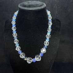 "Vintage Silver Tone Faceted Clear And Blue Beaded Necklace. There are no hallmarks on the necklace. I tested the beads with my Presidium Gem Tester II. The blue beads tested glass and the clear beads tested between Quartz and Spinel. It has a barrel clasp. The necklace measures: 18\" The blue beads are all the same size :8.5mm The clear beads start small and get bigger starting at: 9.5 mm to the largest one : 13.9 mm. They weigh 2.35 oz It comes with a gift box. (Jewelry #3141) USA Seller!! Est Blue Glass Necklaces With Spacer Beads, Blue Faceted Beads Crystal Necklaces, Formal Crystal Beaded Necklaces With Round Beads, Blue Crystal Jewelry With Polished Beads, Blue Crystal Round Beads, Blue Beaded Crystal Necklace, Crystal Beaded Necklaces With Single Strand Of Round Beads, Single Strand Crystal Beaded Necklaces With Round Beads, Blue Crystal Necklaces With Faceted Beads