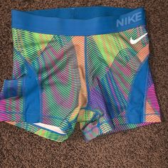 Nike Multicolored Shorts. Never Worn. No Tags Summer Color Block Fitted Pants, Fitted Summer Color Block Pants, Fitted Color Block Pants For Summer, Casual Stretch Multicolor Athletic Shorts, Nike Fitted Bottoms For Summer, Blue Sports Pants For Summer, Nike Sporty Summer Pants, Multicolor Stretch Shorts With Built-in Shorts, Casual Multicolor Workout Bottoms