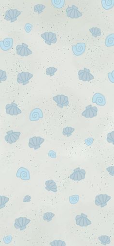 a blue and white wallpaper with seashells on it