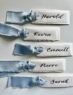 four pieces of cloth with the names of each fabric