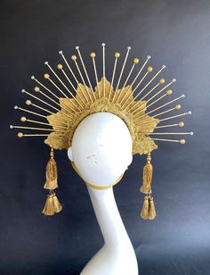 "Sun Goddess Crown Headband with Crystals, Halo Headpiece, Bridal Headdress, Virgin Mary, Saints, Burning Man, 6\" Gold Spikes, Gold Tassels READY TO SHIP A perfect halo crown just for you! This crown is lovingly handmade and very sturdy. Each spike is drilled into the headband and then anchored. Then I have carefully wrapped and woven them to be completely secured. These are not just stuck onto the top of the headband with glue. It is a long process to make these headbands perfect! These are ma Diy Gold Headpiece, Sun Headdress, Sun Headpiece, Sun Crown, Gold Sun Headpiece, Gold Structured Crown Headpiece For Festival, Sun Halo Crown, Gold High Crown Headpiece For Festivals, Virgin Mary Costume