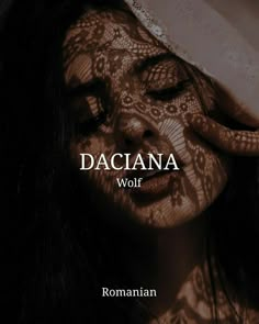 a woman with her eyes closed and the words daciana wolf above her face