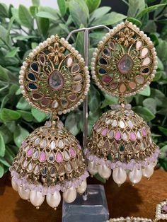 Top class mirror work. Brass base , antique platting , silver mirror and colored bead work. Jhumka is about 5 inch long and Tikka is 3 inch long and 2.75 inch wide. Festive Bollywood Chandbalis With Mirror Work, Bollywood Style Festive Chandbalis With Mirror Work, Bollywood Style Chandbalis With Mirror Work For Festive Occasions, Bollywood Chandbalis With Mirror Work For Navratri, Bollywood Style Chandbalis With Mirror Work For Navratri, Bohemian Chandbalis With Cutdana For Festive Season, Chandbali Danglers With Mirror Work For Festive Occasions, Bohemian Kundan Danglers With Stone Work, Festive Temple Jewelry Danglers With Mirror Work