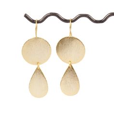 Specification of earrings: Plating : Matte Finish Metal : Brass Color: Gold earrings Length: See The Variation Shape: Fancy Shape You will receive exact as picture of earrings made with a matter finsh . The trimmed. The color is gold with patterns, which looks beautiful outlined in brass gold plated . These quartz are beautifully made and packed with sparkle. These are perfect for parties and celebrating with just a little bit of glamour. They are perfect for bangles These are so incredibly beau Minimalist Teardrop Earrings For Party, Brass Earrings With Ear Wire For Party, Party Drop Linear Earrings With Ear Wire, Round Brass Earrings For Party, Brass Round Earrings For Party, Brass Earrings For Parties, Nickel Free Drop Earrings For Celebrations, Nickel-free Dangle Wrap Earrings For Party, Nickel-free Teardrop Earrings For Parties