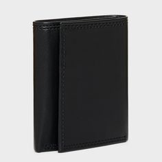 Carry your cards and money in comfortable style with this Extra-Capacity Trifold Wallet from Goodfellow & Co™. This tri-fold wallet features multiple card slots, ID pocket and a bill compartment, while the tri-fold design lends it a non-bulky feel, making it easier to slip in the front or rear pockets of your trousers. Best of all, it features RFID blocking that helps prevent your cards and IDs from digital theft. Showcasing a faux-leather finish in black, it's sure to bring classic style to you Trifold Wallet With Interior Card Slots For Everyday Use, Trifold Wallet With Interior Card Slots, Formal Trifold Wallet With Interior Card Slots, Formal Trifold Wallet With Card Slots, Classic Trifold Wallets For Everyday Use, Trifold Wallet With Card Slots For Everyday Use, Everyday Trifold Wallet With Coin Pocket, Classic Trifold Wallet For Business, Everyday Trifold Wallet With Card Slots