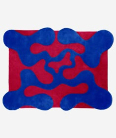 a rug with blue and red shapes on it