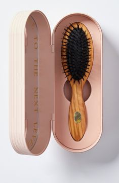 What it is: A natural hair- and scalp-care tool with boar bristles, specially developed to nourish and protect fine-to-medium hair types.Who it's for: Ideal for fine-to-medium hair types.What it does: The petite brush size is perfect to accompany you daily or on your travels. Boar bristles are the only fiber capable of providing real benefits to hair by distributing scalp's natural oils from roots to ends to deliver nourishment and protection, leaving hair soft, shiny and smooth. The soft-yet-fi Gold Hair Brush, Oily Hair Remedies, Boar Brush, Boar Bristle Brush, Bamboo Brush, Hair Kit, Bath Essentials, Stimulate Hair Growth, Hair Remedies