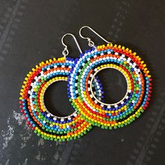 Hoop Dangle Earrings Hoop Earrings Boho Earrings Tribal Ethnic - Etsy Bohemian Multicolor Hoop Earrings, Multicolor Small Hoop Jewelry With Dangling Beads, Traditional Multicolor Hoop Earrings, Traditional Multicolor Round Hoop Earrings, Multicolor Dangle Hoop Earrings For Festival, Small Hoop Beaded Earrings For Festival, Festival Small Hoop Beaded Earrings, Multicolor Dangling Beads Hoop Earrings, Bohemian Rainbow Jewelry With Dangling Beads