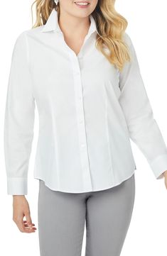 A crisp button-up shirt made from breathable cotton is a refined and classic wardrobe staple that elevates your style portfolio. 26" length Spread collar Long sleeves with button cuffs 100% cotton Machine wash, line dry Imported Classic White Blouse With Hidden Buttons, Classic White Blouse With Hidden Button Closure, Classic Wrinkle-resistant Shirt For Spring, Elegant Wrinkle-resistant Button-up Shirt, Classic Daywear Blouse, Classic Relaxed Fit Blouse For Business Casual, Classic Button-up Dress Shirt For Daywear, Classic Button-up Shirt For Daywear, Classic Button-up Shirt With Concealed Placket