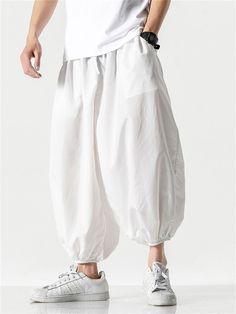 Description Product ID: MBT2031420 Material: Cotton, Polyester Pattern: Solid Season: Summer Style: Casual Occasion: Daily, Street, Vacation Package included: 1 * Pants Size Chart (Asian Size): Please allow 1-3 cm measured error. Size Length Waist Hip M 90cm | 35.4 in 68cm | 26.8 in 172cm | 67.7 in L 91cm | 35.8 in 71cm | 28.0 in 174cm | 68.5 in XL 92cm | 36.2 in 74cm | 29.1 in 176cm | 69.3 in XXL 93cm | 36.6 in 77cm | 30.3 in 178cm | 70.1 in 3XL 94cm | 37.0 in 80cm | 31.5 in 180cm | 70.9 in 4XL 95cm | 37.4 in 83cm | 32.7 in 182cm | 71.7 in 5XL 96cm | 37.8 in 86cm | 33.9 in 184cm | 72.4 in Casual Baggy Harem Parachute Pants, White Baggy Casual Harem Pants, White Casual Harem Pants With Elastic Waistband, Casual White Harem Pants With Elastic Waistband, Baggy Parachute Pants For Summer, Baggy Wide-leg Parachute Pants For Summer, White Parachute Pants With Tapered Leg, White Parachute Pants With Tapered Legs, Casual Spring Harem Parachute Pants