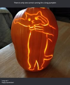 a carved pumpkin with an image of a cat on it's face and the words, there is only one correct carving for a long pumpkin