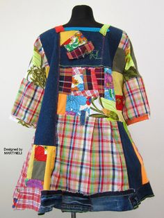 a dress made out of patchwork and fabric