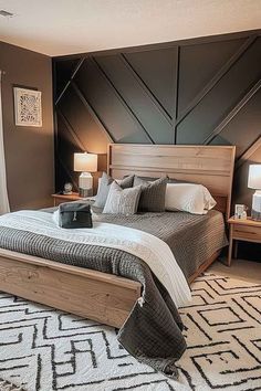 A modern industrial bedroom with a dark accent wall, natural wood bed frame, and sleek decor elements, creating a bold and stylish atmosphere. Modern Bedroom Paneling Ideas, Wood Design Wall Bedroom, Vaulted Bedroom Wall Ideas, Wood Master Bedrooms Decor, Charcoal Bedroom Accent Wall, Black Fox Accent Wall, Neutral Bedroom With Accent Wall, Accent Wall Bedroom Paneling, Stone Wall In Bedroom