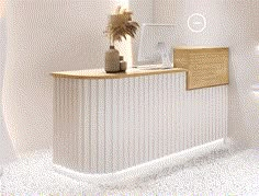 a white and wooden counter in a bathroom