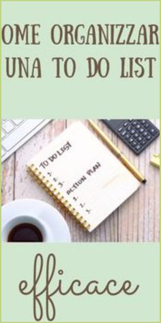 a notepad sitting on top of a desk next to a cup of coffee