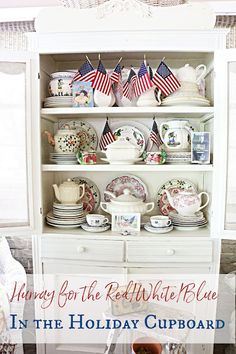 a china cabinet with american flags on it and the words, always for the red white blue in the holiday cupboard