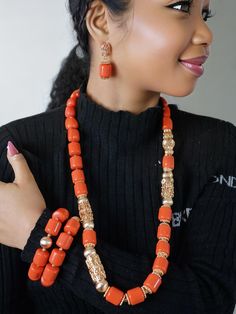 Handmade African Coral Necklace Set Elegant Beaded Festive Sets, Elegant Beaded Sets For Festive Occasions, Elegant Beaded Sets For Festive Season, Elegant Beaded Wedding Sets, Jewelry Sets With Round Beads For Celebrations, Elegant Gold Beaded Sets, Elegant Handmade Festive Beads, Orange Costume Jewelry For Formal Occasions, Elegant Handmade Gold Set