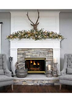 a living room filled with furniture and a fire place in front of a brick fireplace