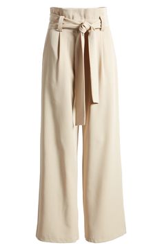 Wide legs punctuate these tailored pants designed with a drapey tie belt and crisp pleats. Zip fly with hook-and-bar closure Ties at waist Side pockets Lined 100% polyester Hand wash, dry flat Imported Wide Leg Pants Belt, Belted Beige Trousers, Chic Beige Pants For Daywear, Belted Pants For Work, Beige Wide Leg Pants With Tie Waist, Summer Workwear Bottoms With Belt Detail, Summer Belted Tapered Leg Pants, Belted Wide-leg Pants For Office, Belted High-waisted Wide Leg Pants For Office