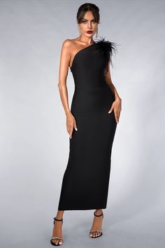 Casandra Feather One Shoulder Black Dress Introducing the epitome of elegance and sophistication, the Casandra Feather One Shoulder Black Dress. This exquisite gown combines timeless allure with modern craftsmanship to ensure you make a stunning impression at any formal event. Luxurious Materials & Craftsmanship Fabric composition: 90% polyester fiber, 10% spandex for flexibility and comfort Handmade customization ensures a perfect fit Detailed feather embellishments add an enchanting touch The Casandra Feather Dress is meticulously crafted to offer both elegance and functionality. Its luxurious blend of polyester and spandex offers the right balance between form-fitting comfort and stretch, making it ideal for long nights on the dance floor. Perfect for Any Event Gala events: The dress's One Shoulder Dress Accessories, Accessories With Black Dress, Gown With Feathers, One Shoulder Black Dress, Black Feather Dress, One Shoulder Dresses, Fashion Dresses For Women, Exquisite Gowns, Shoulder Dresses