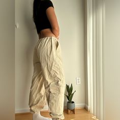 Asos Cargo Pants - Size Us 8 Like New! - No Tags But Never Worn - Cream,Tan Color Great Basic To Go With Any Fit - Cinched Waist And Bottoms Which Are Adjustable Casual Straight Leg Neutral Cargo Pants, Beige Utility Trousers, Casual Beige Tapered Leg Parachute Pants, Casual Beige Tapered-leg Parachute Pants, Beige Cargo Style Tapered Leg Pants, Casually Loose-fit Cream Bottoms, Beige Relaxed Fit Cargo Bottoms, Casual Cream Bottoms With Side Pockets, Casual Cream Tapered Leg Pants