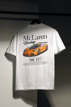 🏁 Rev up your style with FirstGears' McLaren F1 Vintage T-shirt. Made from comfortable 100% cotton, this shirt is a nod to Formula 1 excellence. The front proudly displays the McLaren Formula 1 Team logo and the words "McLaren Formula 1 Team" - a sleek tribute to racing greatness. Flip the shirt, and you'll find an Orange McLaren F1 on the back, accompanied by the text "McLaren Racing" - a simple yet powerful celebration of this legendary car's racing prowess. 🌎 SHIPPING As these shirts are ha Casual Short Sleeve T-shirt For Motorsport Events, White Racing Style T-shirt With Graphic Print, White Cotton Racing T-shirt, Casual White Tops For Motorsport Events, White T-shirt With Motorsport Letter Print, White Letter Print T-shirt For Motorsport Events, Casual Crew Neck Tops For Motorsport Events, Cotton T-shirt For Motorsport Events, Casual T-shirt With Letter Print For Motorsport Events