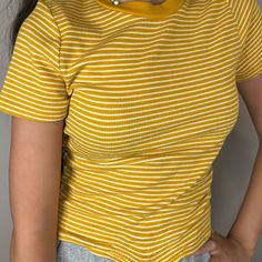 Yellow Striped T-Shirt.Never Worn.No Flaws/Great Condition!Just Wasn’t For Me Striped Ribbed Crew Neck T-shirt, Trendy Ribbed T-shirt For Spring, Fitted Striped T-shirt For Spring, Trendy Yellow Stretch T-shirt, Trendy Stretch Yellow T-shirt, Casual Ribbed Crop Top T-shirt, Ribbed Fitted Top T-shirt For Summer, Summer Ribbed Fitted T-shirt, Fitted Striped Ribbed T-shirt