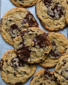 chocolate chip cookies on a baking sheet ready to be eaten