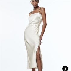 Straight Neck Dress With Spaghetti Straps With Matching Chain Appliqus. Ruching Detail And Slit At Side. Hidden In-Seam Zip Closure. Color Is Oyster White. Chain Strap Dress, Zara Slip Dress, Satin Camisole, Chain Dress, Dress Zara, Camisole Dress, Strappy Dresses, Satin Midi Dress, Necklines For Dresses