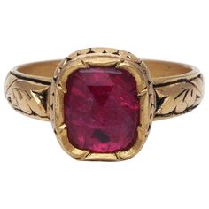 A ring with natural Ruby hand made in 18K Gold with intricate floral work on Gold. The work on Gold is a very old Indian technique called "Partash" which can be only done by hand. This gives the ring great detailing and makes it unique. Ring Size: US7.8 Traditional Oval Ring With 17 Jewels, Traditional Yellow Gold Ruby Ring, Traditional Carved Yellow Gold Rings, Heirloom Carved Yellow Gold Rings, Traditional Ruby Ring In Yellow Gold, Ceremonial Yellow Gold Rings With Rose Cut Diamonds, Gold Ruby Rings With Intricate Design, Traditional Yellow Gold Ruby Ring With Gemstone, Victorian Ceremonial Rings With Gemstones