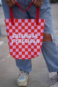 A spacious and trendy tote bag to help you carry around everything that matters. * 100% spun polyester fabric * Bag size: 15″ × 15″  * Capacity: 2.6 US gal  * Maximum weight limit: 44lbs (20 kg) * Dual handles made from 100% natural cotton bull denim * Handle length 11.8″ * The handles can slightly differ depending on the fulfillment location This product is made especially for you as soon as you place an order, which is why it takes us a bit longer to deliver it to you. Making products on deman Red Bucket Bag With Large Capacity, Red Square Bucket Bag For Daily Use, Red Satchel Canvas Bag For Shopping, Red Large Capacity Pouch-shaped Bucket Bag, Red Large Capacity Bucket Bag, Red Bucket Gift Bag, Red Canvas Satchel For Shopping, Red Bucket Shoulder Bag As Gift, Red Bucket Shoulder Bag For Gift