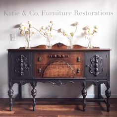 an old dresser with flowers in vases on top and the words kate & co furniture restorations above it