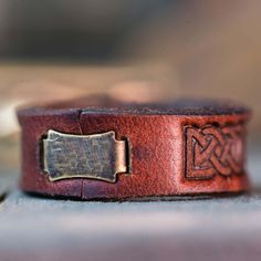 Note, due to the popularity of our leather rings, it may take 1-2 weeks for your order to ship. Don't worry though, it will be worth it! Our Leather Ring Leather has been everywhere and done everything. It's classy, dependable, rugged and refined. There's nothing that feels quite like it and we wanted to have a ring crafted from it that was like nothing else you've ever seen or worn. Mani in Fede - The Claddagh Design As ancient as Roman times, the Claddagh design is known to us as an Irish symb Leather Rings, It Will Be Worth It, Irish Symbols, Ring Leather, Hands Together, Leather Ring, Ring Crafts, Wood Rings, Ring Fit