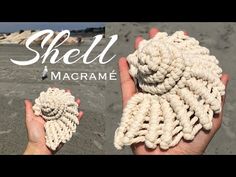 a hand holding up a crocheted shell on the beach with text overlay that reads macrame shell