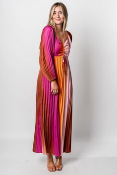 Pleated maxi dress from Lush Fashion Lounge women's boutique in Oklahoma City. Lush boutique in OKC has a variety of cute dresses and more! We are loving this trendy maxi dress for any occasion! Model is 5'9 size 28 wearing size small. 100% polyester Bohemian Pleated Maxi Dress For Party, Long Sleeve Rayon Party Dress, Multicolor Pleated Maxi Dress For Party, Flowy Multicolor Floor-length Maxi Dress, Spring Long Pleated Maxi Dress, Pleated Long Maxi Dress For Spring, Spring Vacation Full-length Maxi Dress, Flowy Floor-length Maxi Dress For Brunch, Pink V-neck Rayon Dress