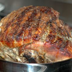 a cooked meat in a pan on the stove