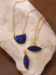 Bohemian Lapis Lazuli pendant necklace in gold plated brass. Suitable for both men and women. Various shapes available. Statement Lapis necklace with adjustable chain length. Durable gold plating, anti-tarnish, non-allergic. Gold Amulet Necklaces With Natural Stones, Gold Amulet Necklace With Natural Stones, Bohemian Gold Lapis Lazuli Necklace, Gold Amulet Necklace With Gemstone, Spiritual Gold Plated Oval Pendant Necklace, Gold Plated Natural Stones Pendant Jewelry, Brass Necklaces With Gemstone Round Pendant, Lapis Lazuli Pendant Necklace For Gift, Gold Lapis Lazuli Spiritual Necklace