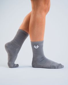 Step in style from the gym to the streets in UPPPER’s Original Grey Crew Socks. Designed to bring comfort to your workout and beyond with cushioning on the sole and ribbed panel for extra arch support, while preventing sweat buildup to keep your feet fresh and cool. So sporty, so on trend. Wear UPPPER Original Grey Socks tall or scrunched with leggings or shorts and your favorite sneakers then you’re ready to conquer your day. This product cannot be returned for hygiene reasons. Features Moisture-wicking to keep feet fresh from the gym to the streets. Breathable to prevent sweat build-up. Cushioned sole for added comfort. Ribbed panel through the middle of the foot for extra arch support. Specifications Color: Grey Pack of three Crew Socks. 43% Bamboo / 42% Cotton / 12% Polyester / 3% Span Sporty Sweat-resistant Socks For Sports, Comfortable Go-dry Socks For Gym, Moisture-wicking Stretch Socks For Gym, Comfortable Sweat-resistant Socks For Gym, Breathable Casual Socks For Gym, Comfortable Sweat-resistant Gym Socks, Breathable Casual Gym Socks, Fade-resistant Gray Sports Socks, Sporty Stretch Moisture-wicking Socks