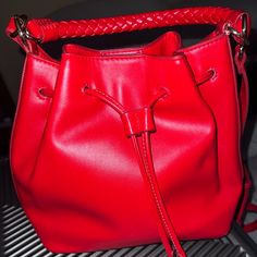 Brand New Trendy Red Pouch Bag, Trendy Red Pouch Satchel, Trendy Red Satchel Bucket Bag, Red Casual Crossbody Bucket Bag, Trendy Red Bucket Bag For Shopping, Casual Red Crossbody Bucket Bag, Casual Red Satchel With Detachable Strap, Casual Red Pouch Satchel, Red Rectangular Bucket Bag With Adjustable Strap