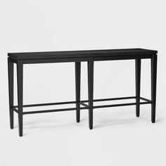 a black table with two legs and a shelf on the top that has an open drawer underneath it