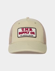 Channel some of your inner-country with this general store-inspired hat. The graphics are double-felt and embroidery for just a touch of vintaged texture. Our high-profile hats fit deep, and adjust with a snap closure to fit any head. High-Profile 5 Panel fit Deep fitting 88% Acrylic / 10% Wool / 2% Spandex front 100% Polyester mesh back Double layer embroidered felt Plastic snap back closure Trucker Hat With Letter Print And 5-panel Shape, Trucker Hat With Letter Print, 5-panel, Beige Trucker Hat With Flat Brim, Beige Flat Bill Trucker Hat For Outdoor, Trucker Baseball Cap With Curved Brim Made In Usa, Beige Trucker Snapback Hat, Beige Snapback Hat With Letter Print, Trucker Baseball Cap With Flat Brim For Baseball Season, Beige Flat Brim Trucker Hat