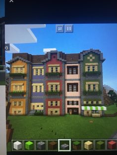 an image of a building in minecraft on a computer screen with other buildings and windows