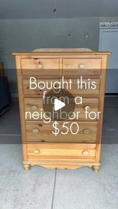 a wooden dresser with the words bought this from a neighbor for $ 50 on it