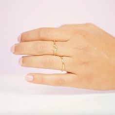 The Moon ring is the perfect dainty gold ring to wear alone or stacked with others. Adding a bohemian touch to your minimalist jewelry look. 18k gold plating over a brass base Available in size 6, 7 and 8 Handmade in America Dainty Gold Ring, Jewerly Set, Printable Ring Sizer, Dainty Gold Jewelry, Layered Rings, Dainty Gold Rings, Bold Rings, Jewels Rings, Moon Ring