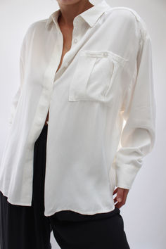 The Nora Relaxed Button Up is a thoughtfully constructed blouse with a focus on tailored details and a functional fit. A refreshing tailored button-up, essential year round, the Nora features a front hidden placket, pleated chest pocket, relaxed sleeves, and generous cuffs. House Products, For Seasons, Midnight Navy, Coconut Cream, Vintage Pieces, Cotton Twill, Chest Pocket, Made In Usa, Button Up